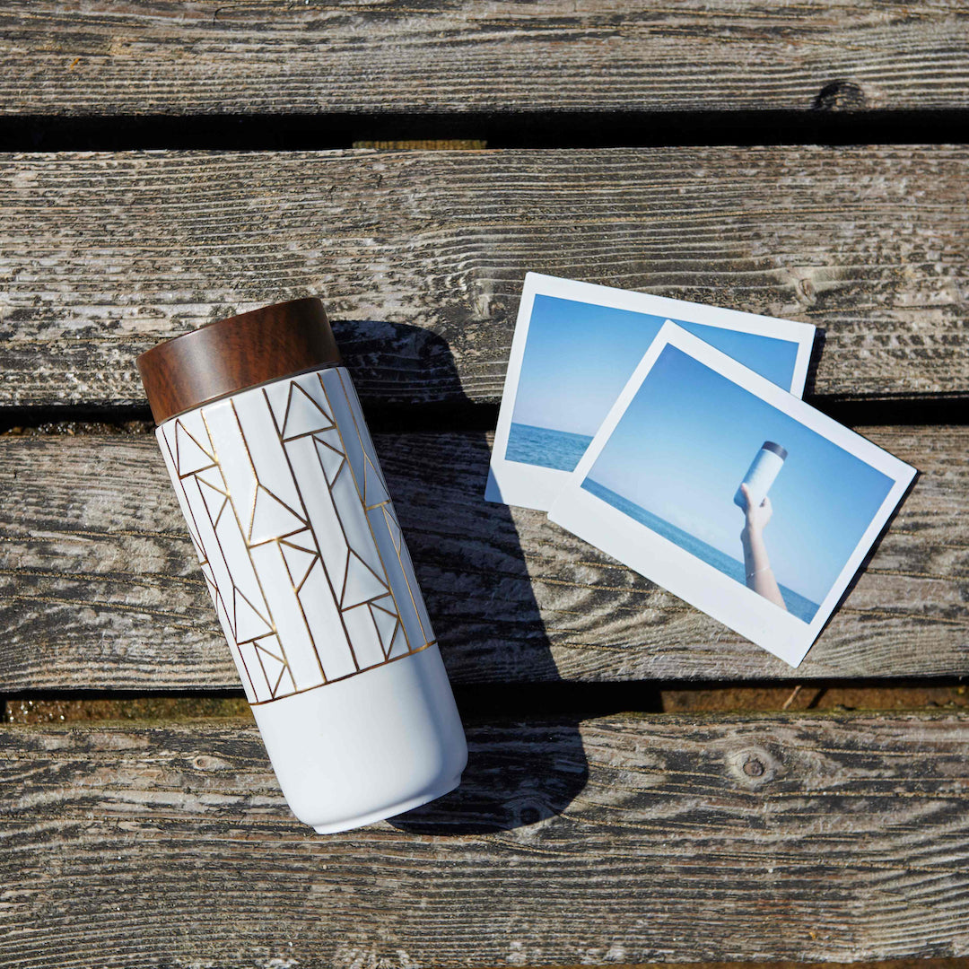 The Alchemical Signs Gold Ceramic Travel Mug by ACERA LIVEN