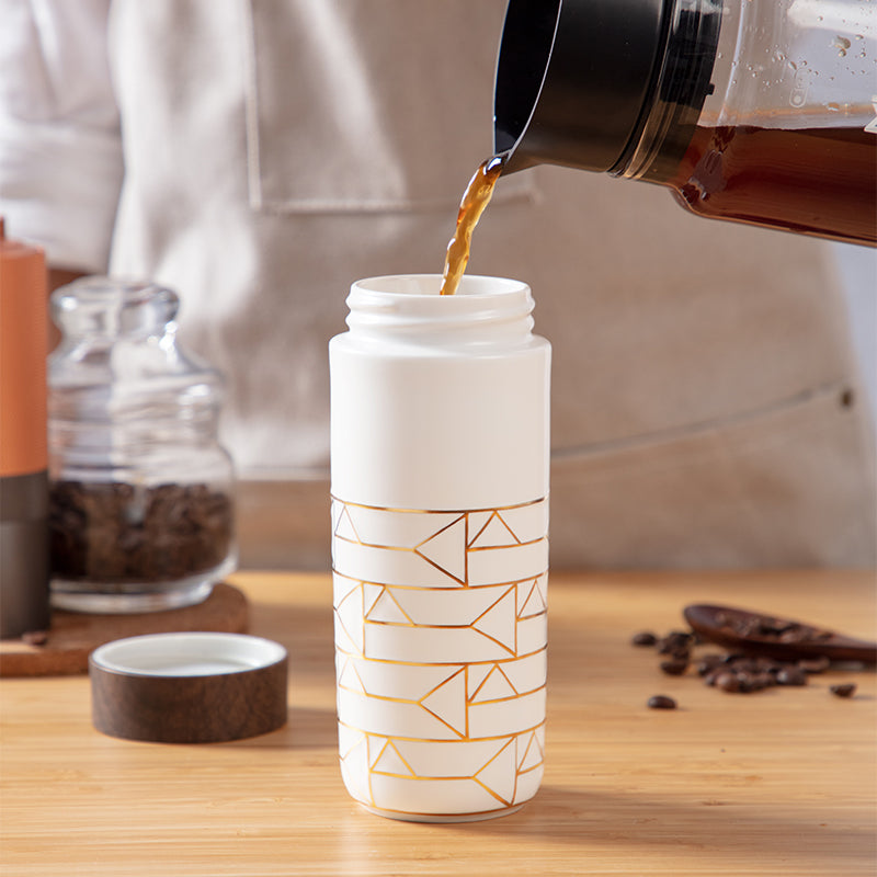The Alchemical Signs Gold Ceramic Travel Mug by ACERA LIVEN
